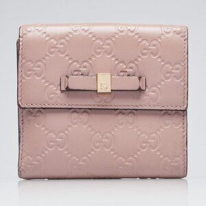 Gucci Pink Guccissima Leather Compact Bow Wallet
